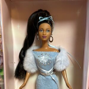 The Zodiac Collection Elegant Sagittarius Barbie Fashion Doll with Accessories.